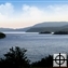 A view over Ellisport Bay, showing part of the peninsula at left, Pearl Island, and Cottage Island.